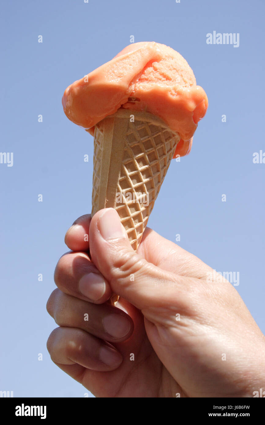Hand Orange Water Ice Ice Cream Ice Cream Icecream Dessert Present Indicate Stock Photo Alamy