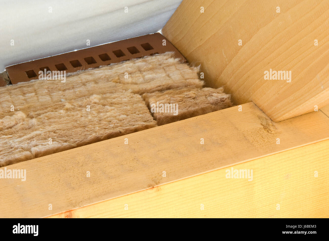 insulate insulation rooftop build foil insulate insulation roof beam energy Stock Photo