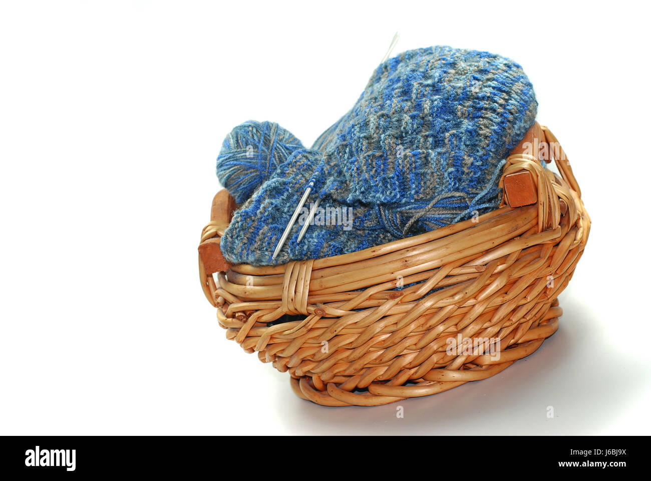 wool knit handicraft knitting handiworks make wool basket sweater knit Stock Photo