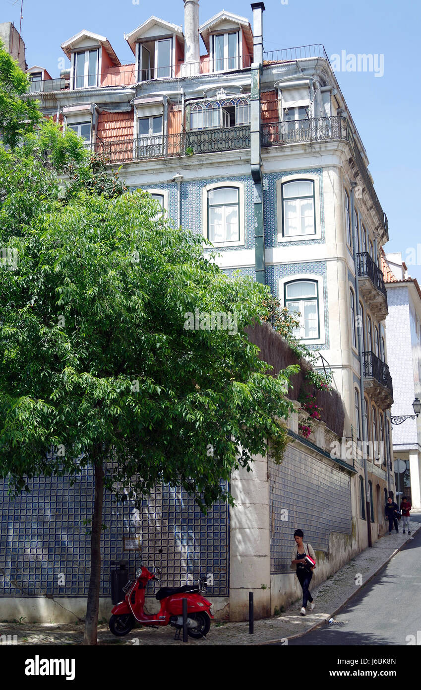 Large house, probably sub-divided into flats, in the university quarter of Lisbon, Portugal, covered in blue and white decorative tiles, Stock Photo