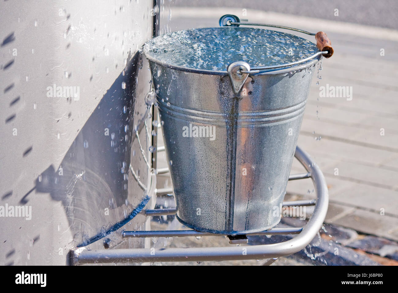 refreshment bucket drinking water water full overflow water drop