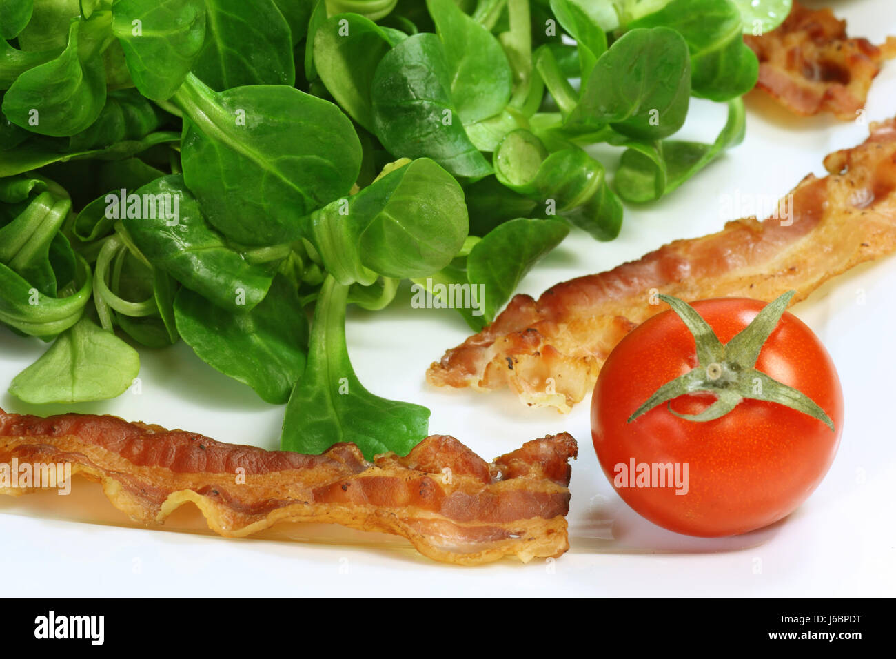 lamb's lettuce salad food aliment rich in vitamins bacon lamb's lettuce salad Stock Photo