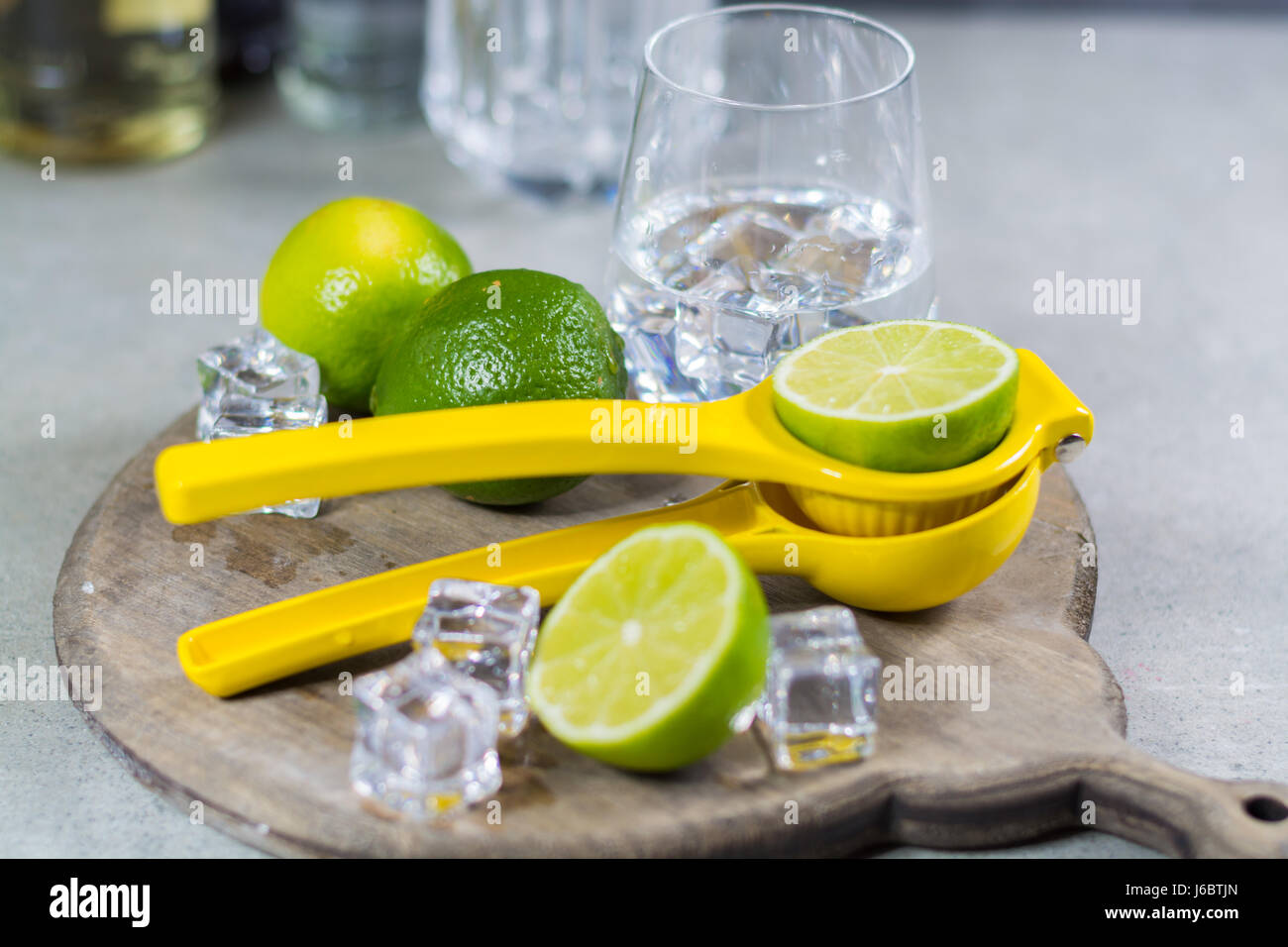 Lime manual press for preparation of cocktails, limes and glass with