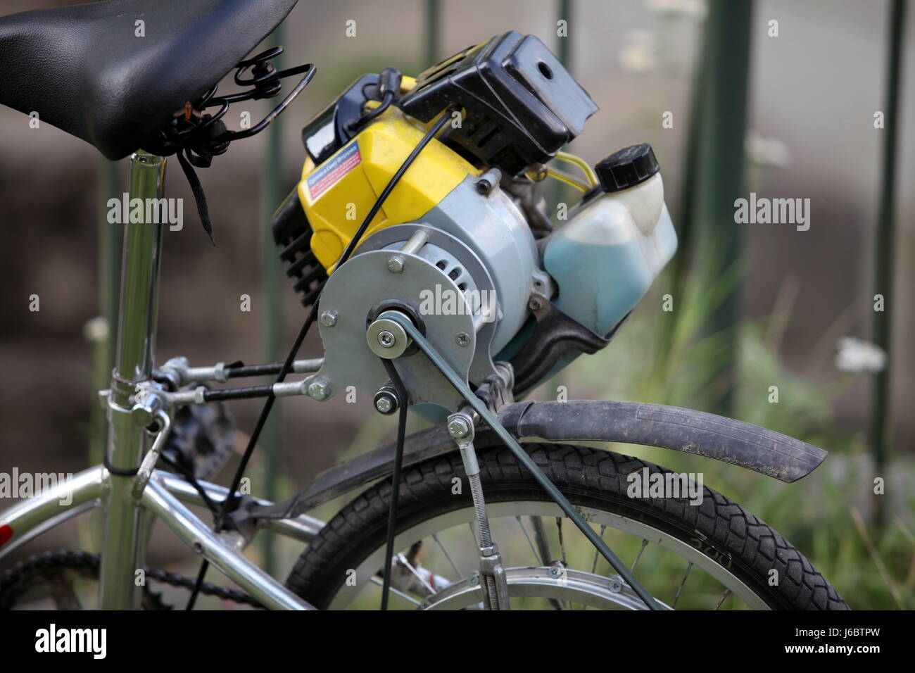homemade, bicycle with a motor of the lawnmower, fragment Stock Photo