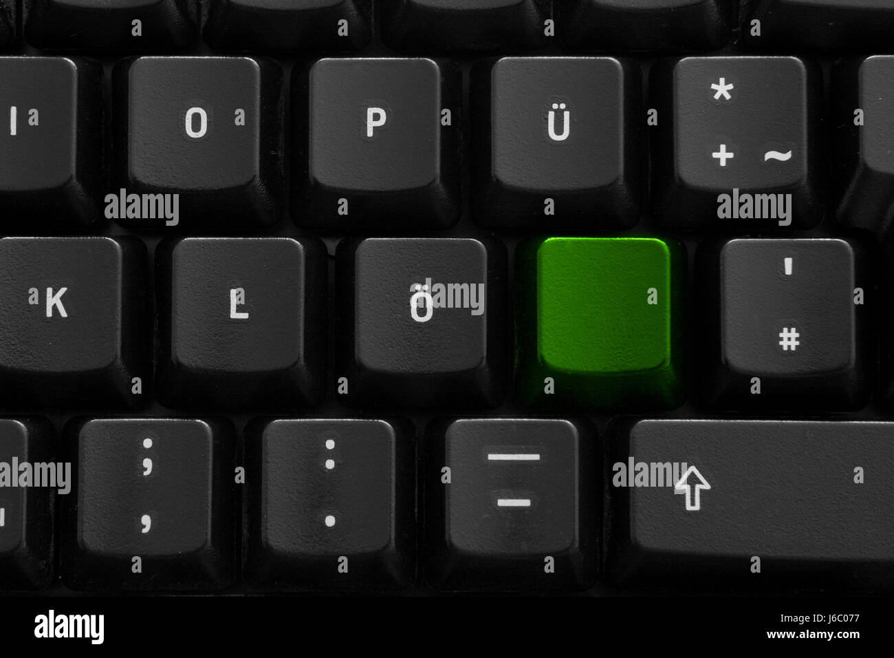 keyboard green letters computers computer PC computers computer closeup black Stock Photo