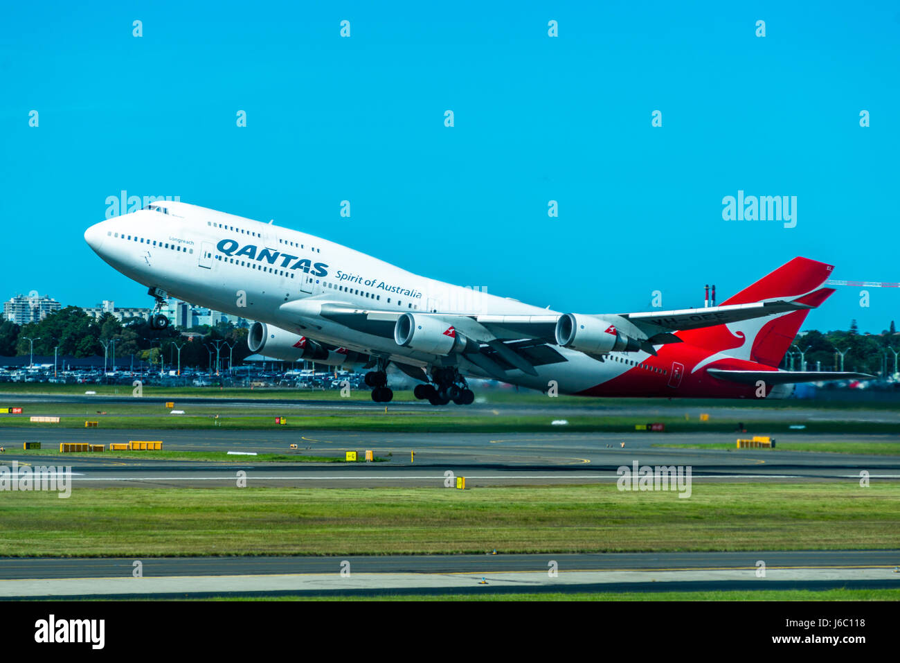 A Qantas jumbo jet taking off from Sydney Airport. New South Wales, Australia. Stock Photo
