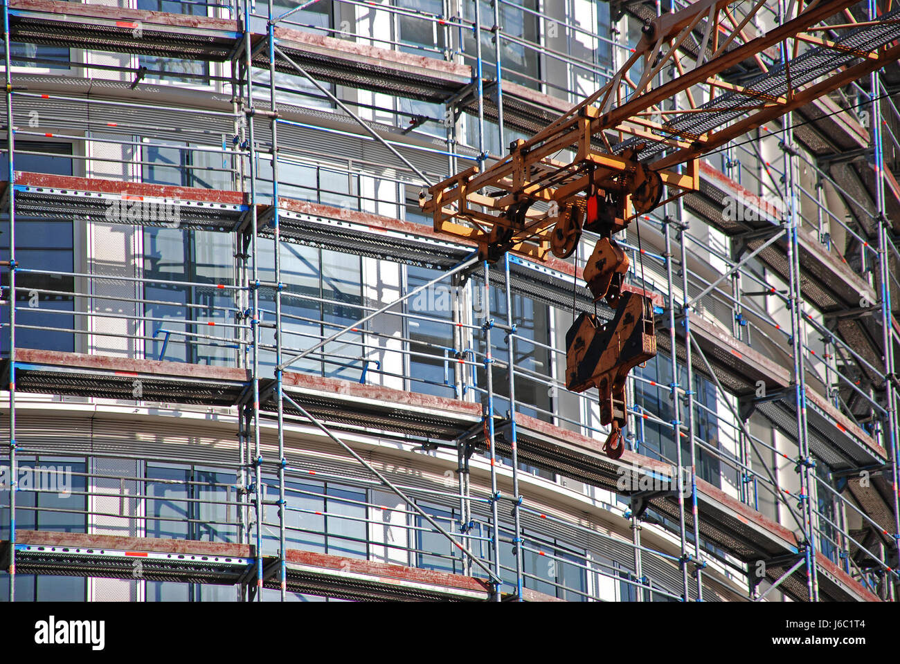 build scaffold scaffolding crane construction site build house multistory Stock Photo