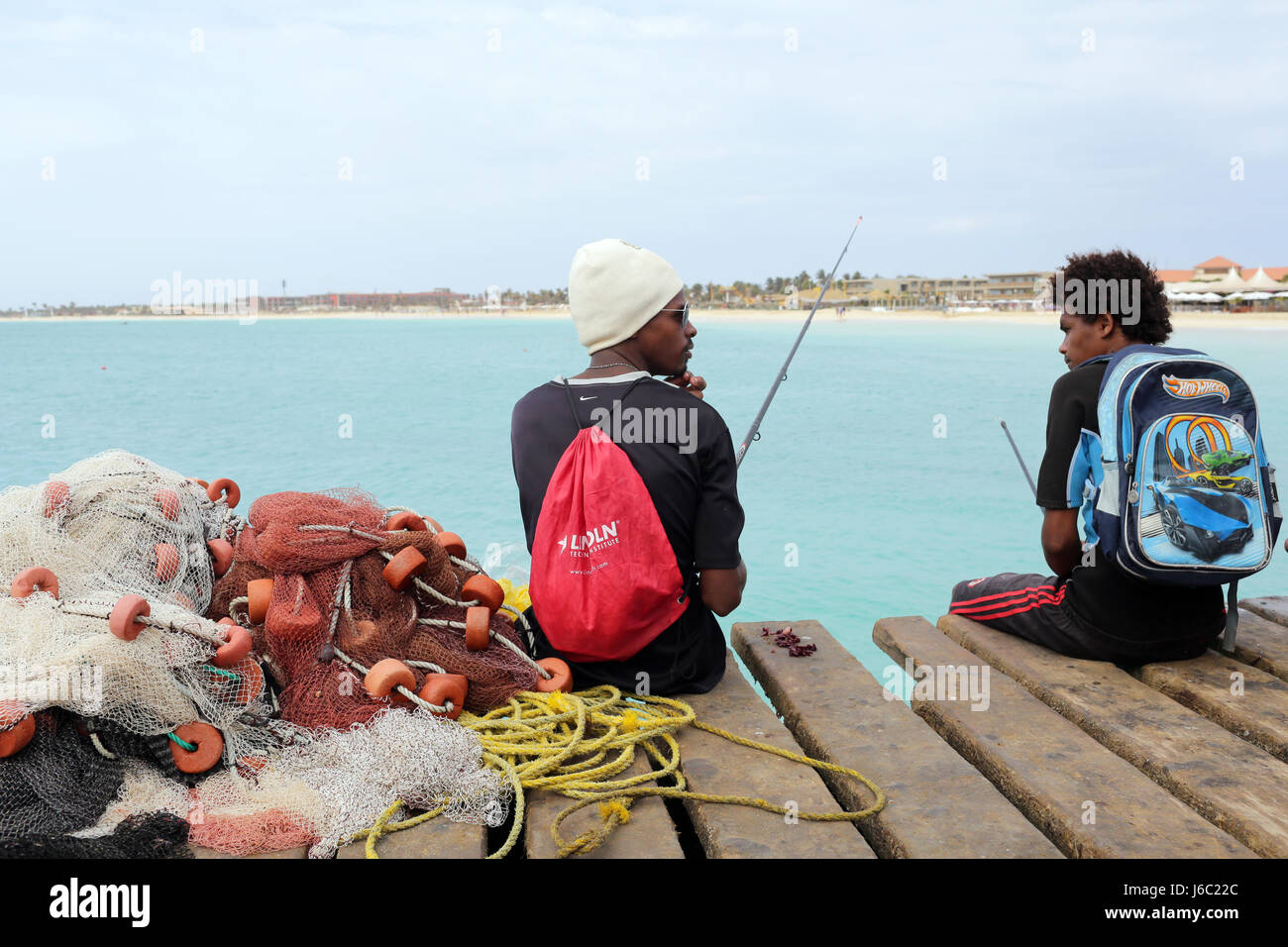 Fishermen sit hi-res stock photography and images - Page 5 - Alamy