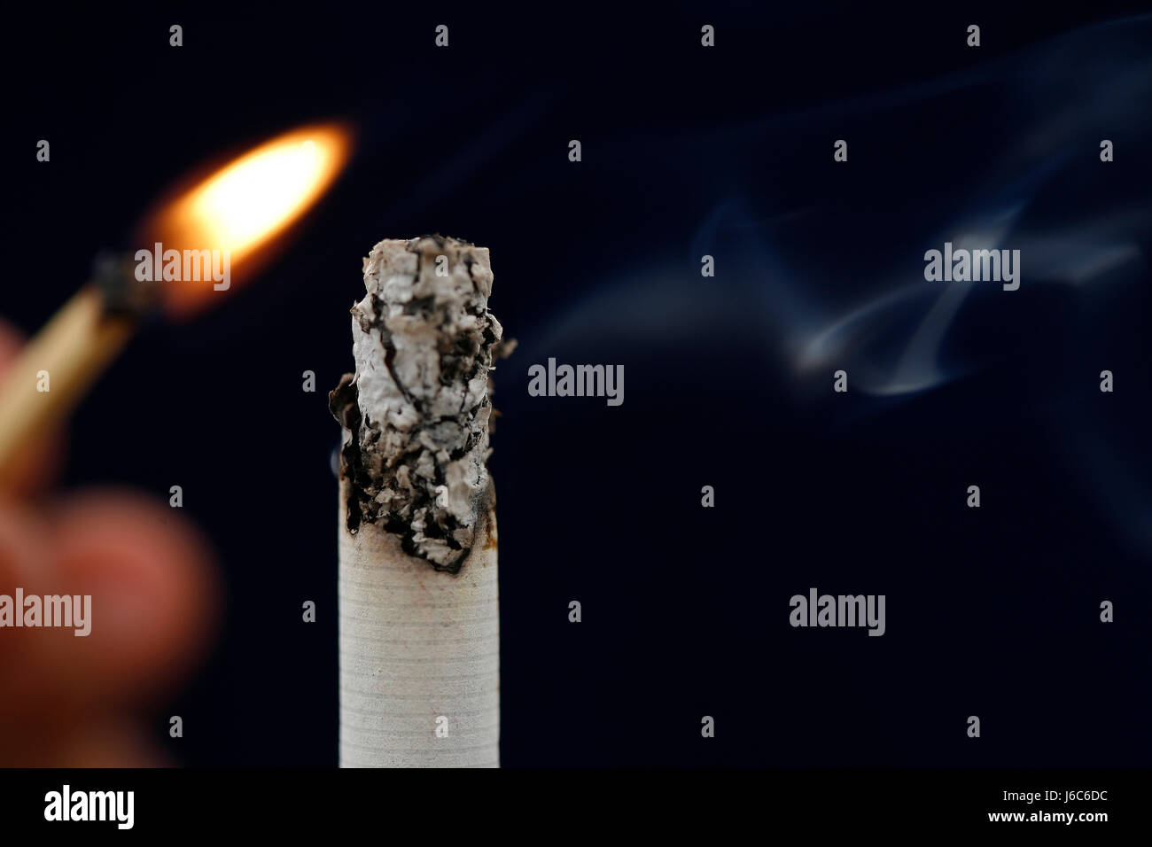 cigarette black swarthy jetblack deep black lust addiction tendency fire  Stock Photo