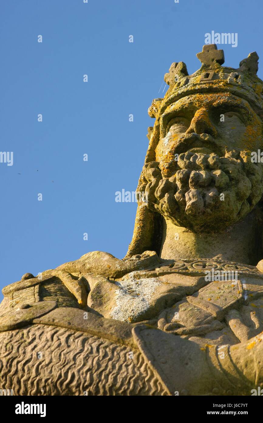 stone statue face scotland crown emperor king blue stone statue face eyes nose Stock Photo