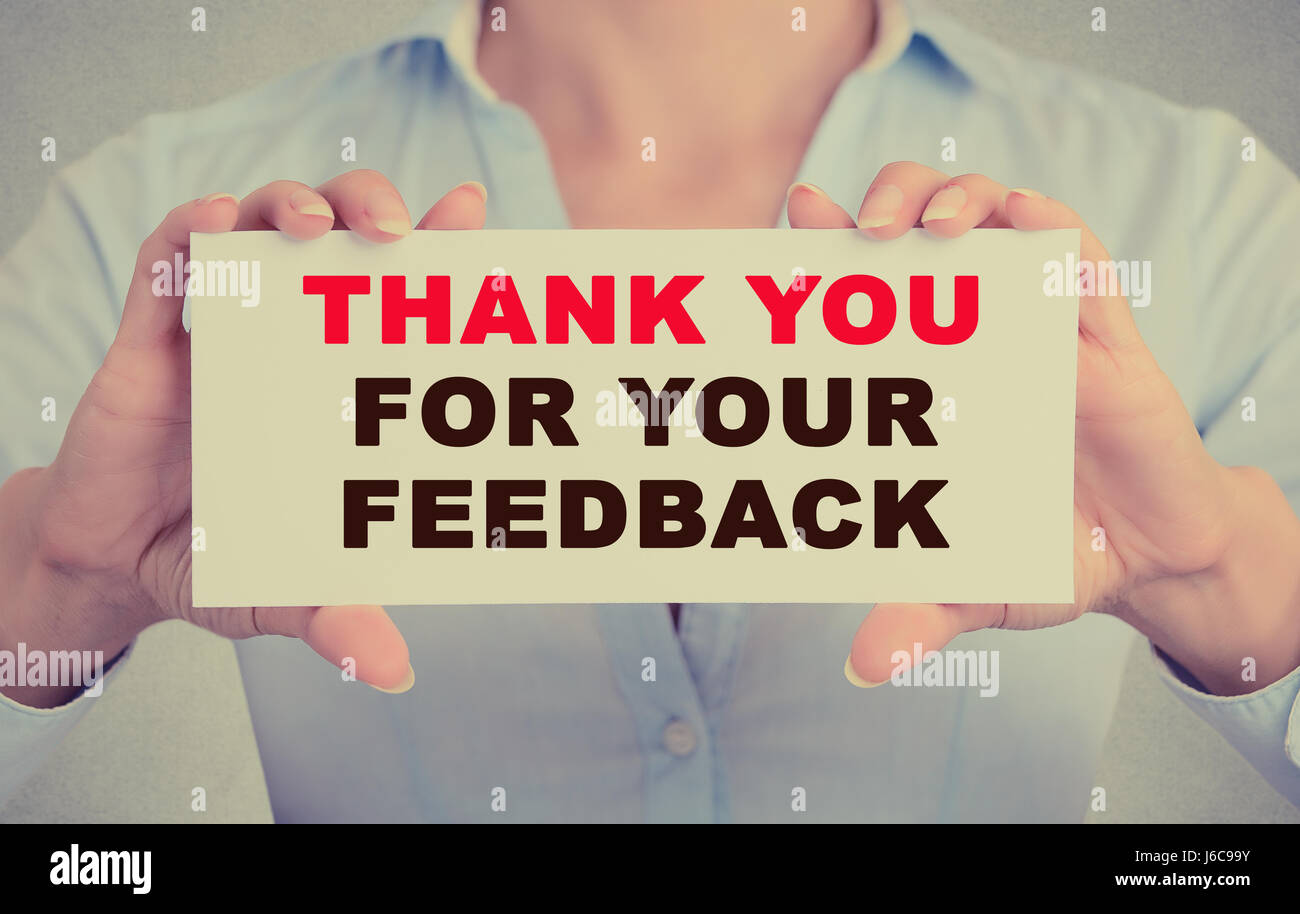 Business woman hands holding white card sign with Thank you for your ...