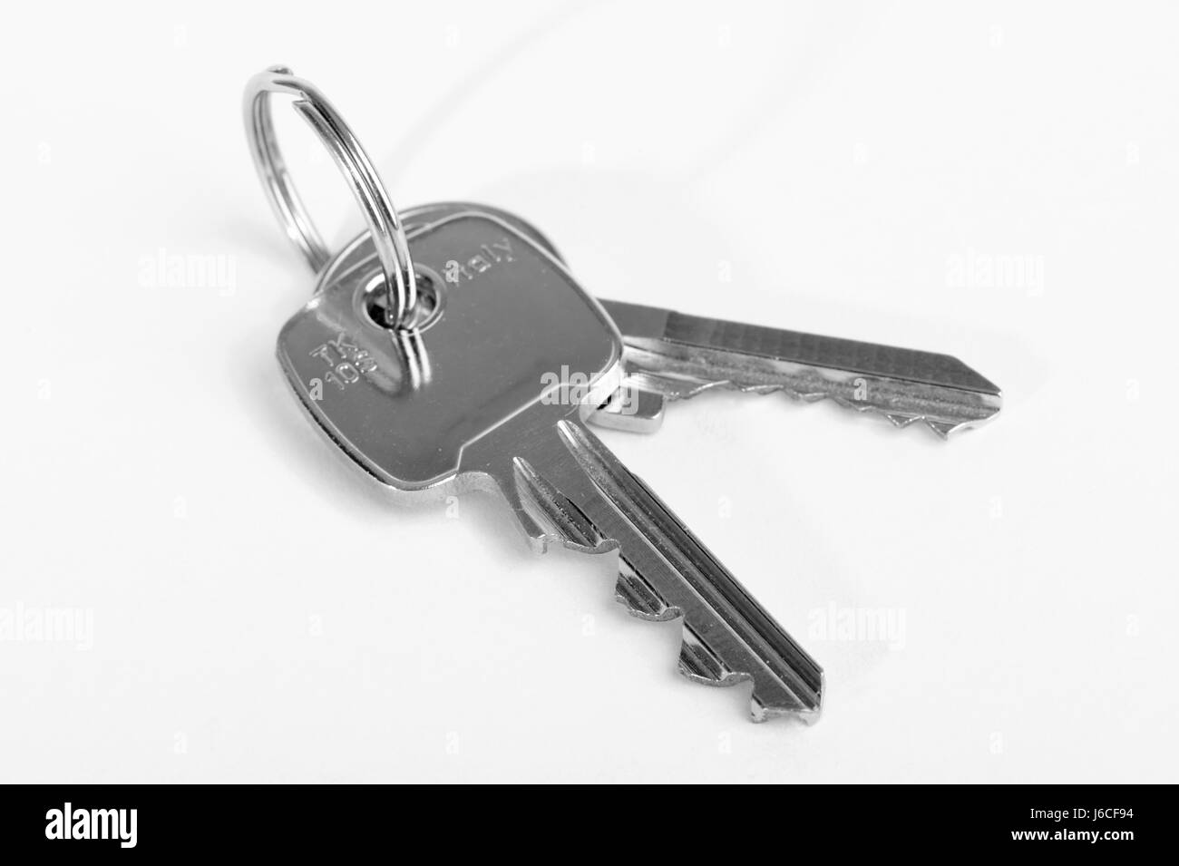 open to lock completed bunch of keys key lock ring door metal key ring open to Stock Photo