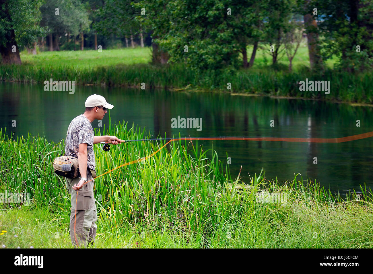 Fly fishing  on the Gacka River, Croatia Stock Photo