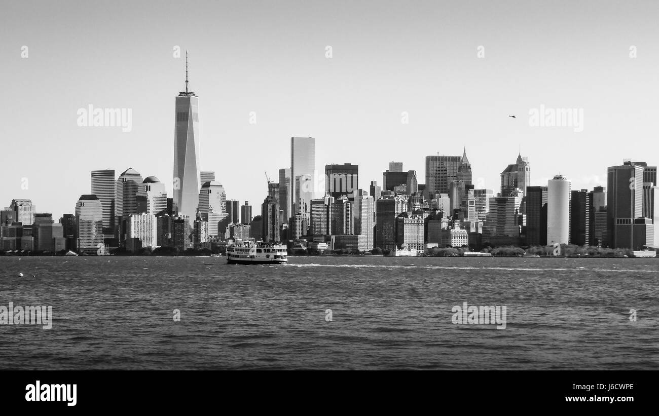 Boat on Hudson River in front of New York Center Skyline World Trade