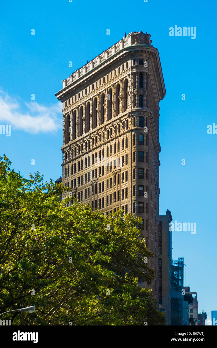 Flat Iron building New York Manhattan in sun blue sky Stock Photo