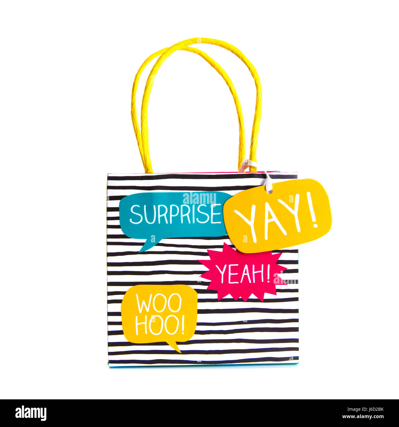 SWINDON, UK - MAY 20, 2017: Gift Bag with Surprise, Yay, Woo Hoo and Yeah ! on a white background Stock Photo