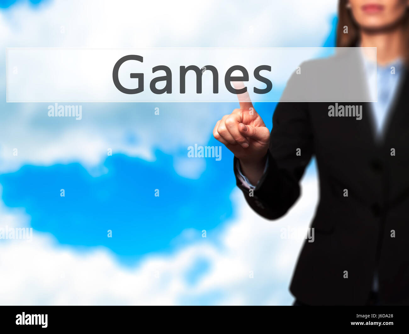 Games - Businesswoman hand pressing button on touch screen interface. Business, technology, internet concept. Stock Photo Stock Photo