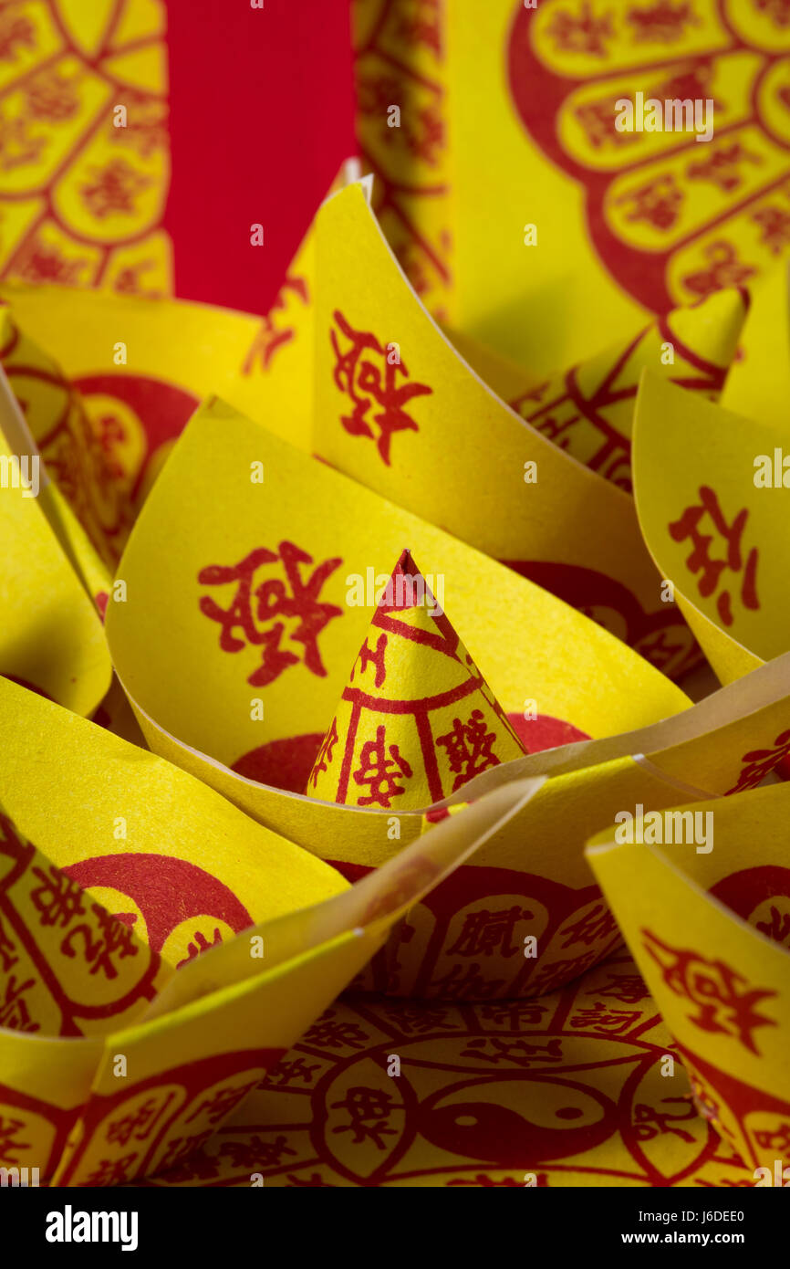 Chinese Joss Paper, Tradition for passed away ancestor's spirits Stock Photo Alamy