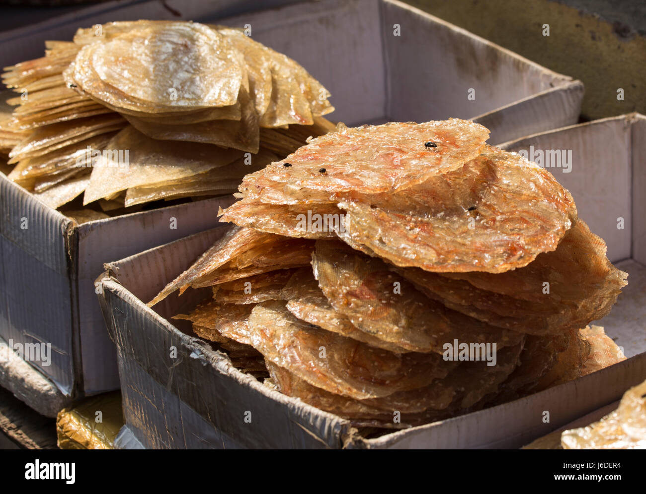 Sale of asian dried squid, a street snack Stock Photo Alamy