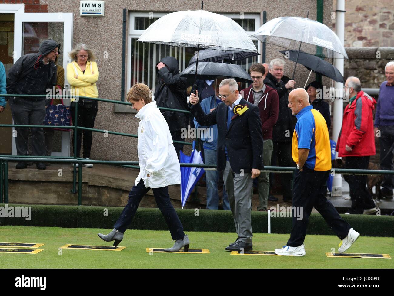 First Minister and SNP leader Nicola Sturgeon walks off the green after throwing a bowl during a visit to the Liberton Bowling Club in Edinburgh South as part of the party's General Election campaign trail. Stock Photo