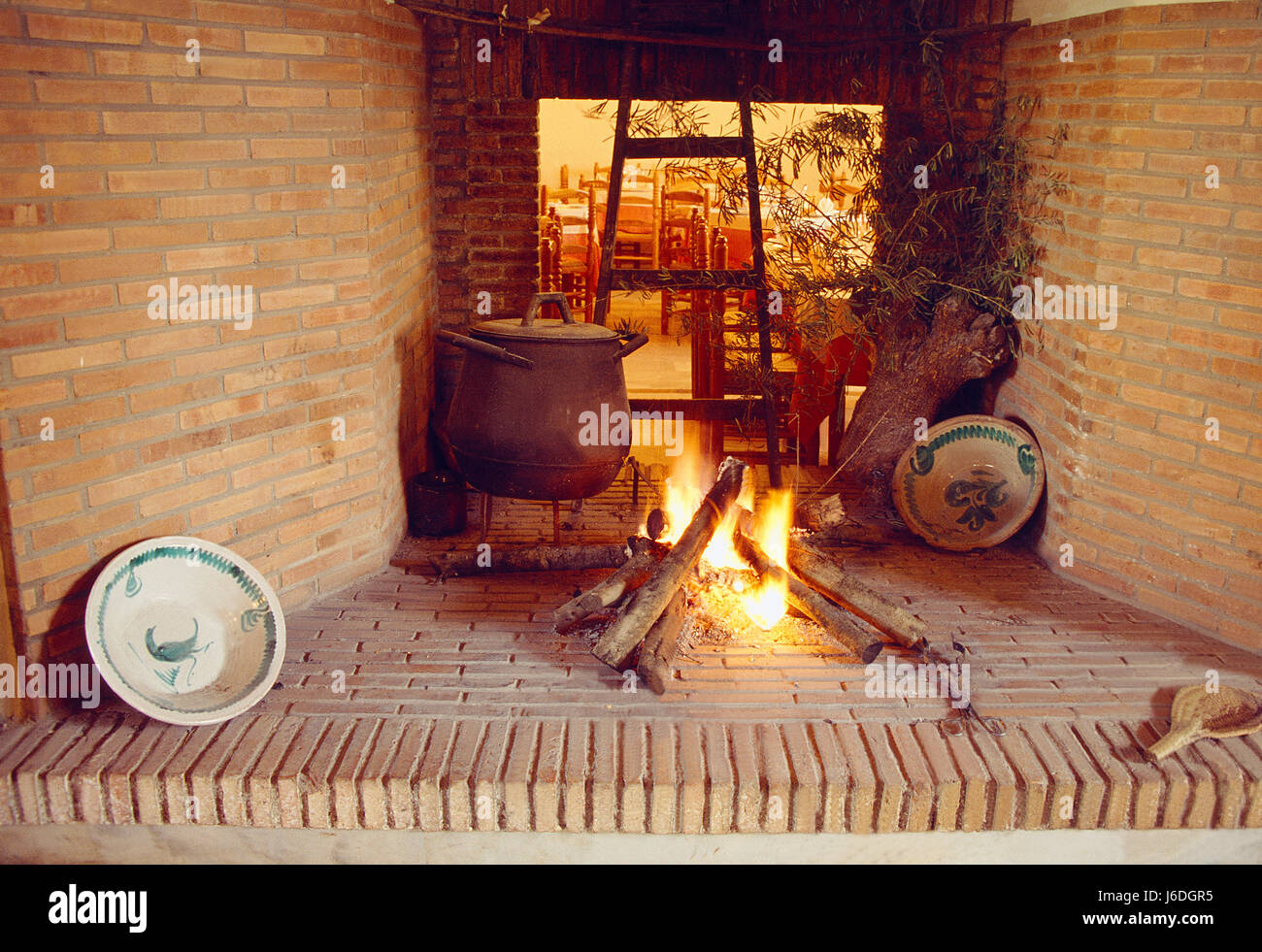 Fireplace in a rural hotel. Andalucia, Spain. Stock Photo