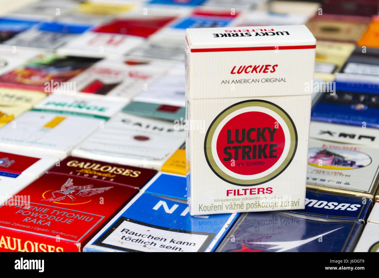 PRAGUE, CZECH REPUBLIC - MARCH 25: Lucky Strike pack on many different cigarettes photographed on March 25, 2017 in Prague, Czech republic. Stock Photo