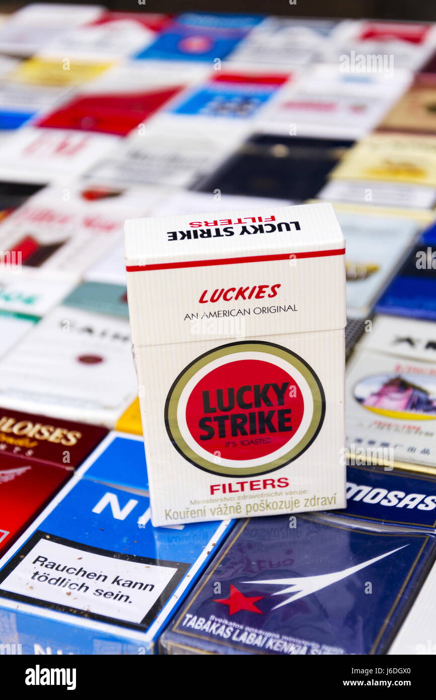 PRAGUE, CZECH REPUBLIC - MARCH 25: Lucky Strike pack on many different cigarettes photographed on March 25, 2017 in Prague, Czech republic. Stock Photo