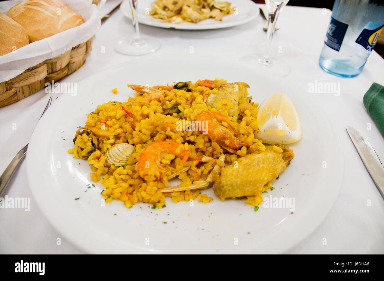 Paella valenciana serving. Valencia, Spain Stock Photo Alamy