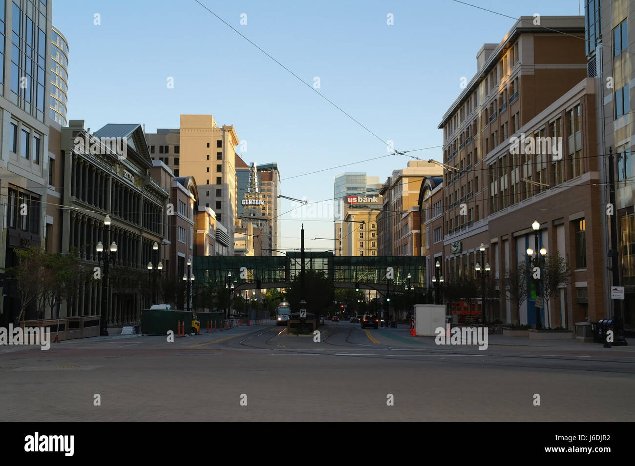 Blue sky afternoon shade view north along Main Street to City Creek Center pedestrian skyway and light rail station, Salt Lake City, Utah, USA Stock Photo