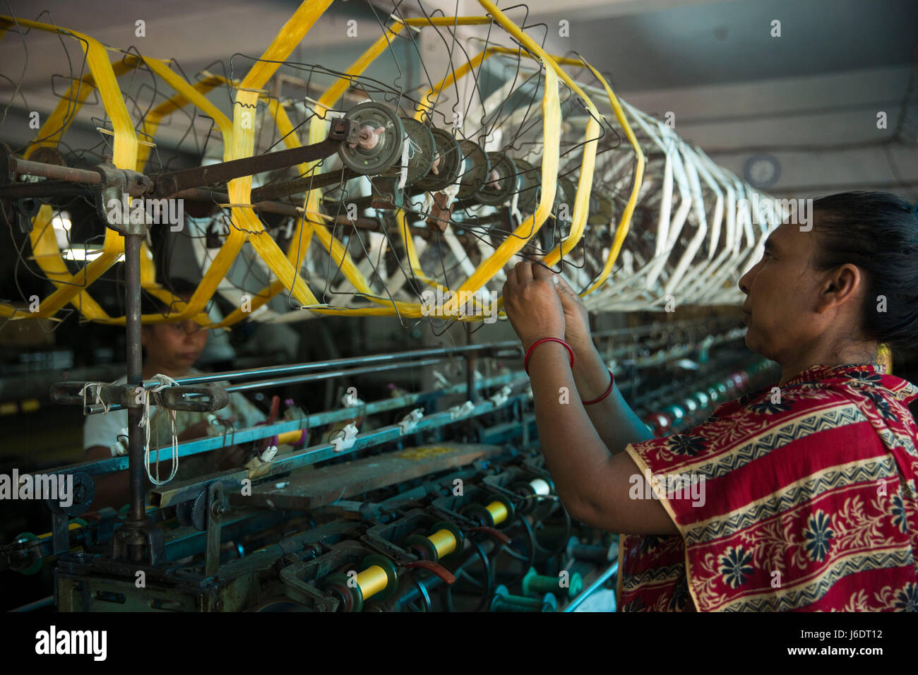Women working in a silk factory. Rajshahi, Bangladesh Stock Photo