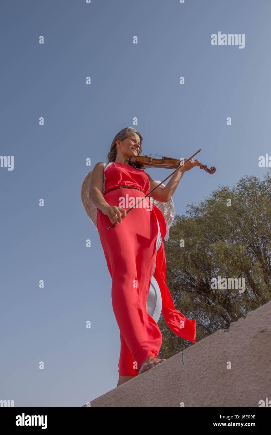 Angel Playing Violin Stock Photo