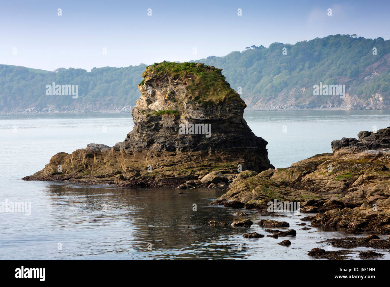 UK, Cornwall, St Austell, rocks at entrance to Charlestown harbour Stock Photo