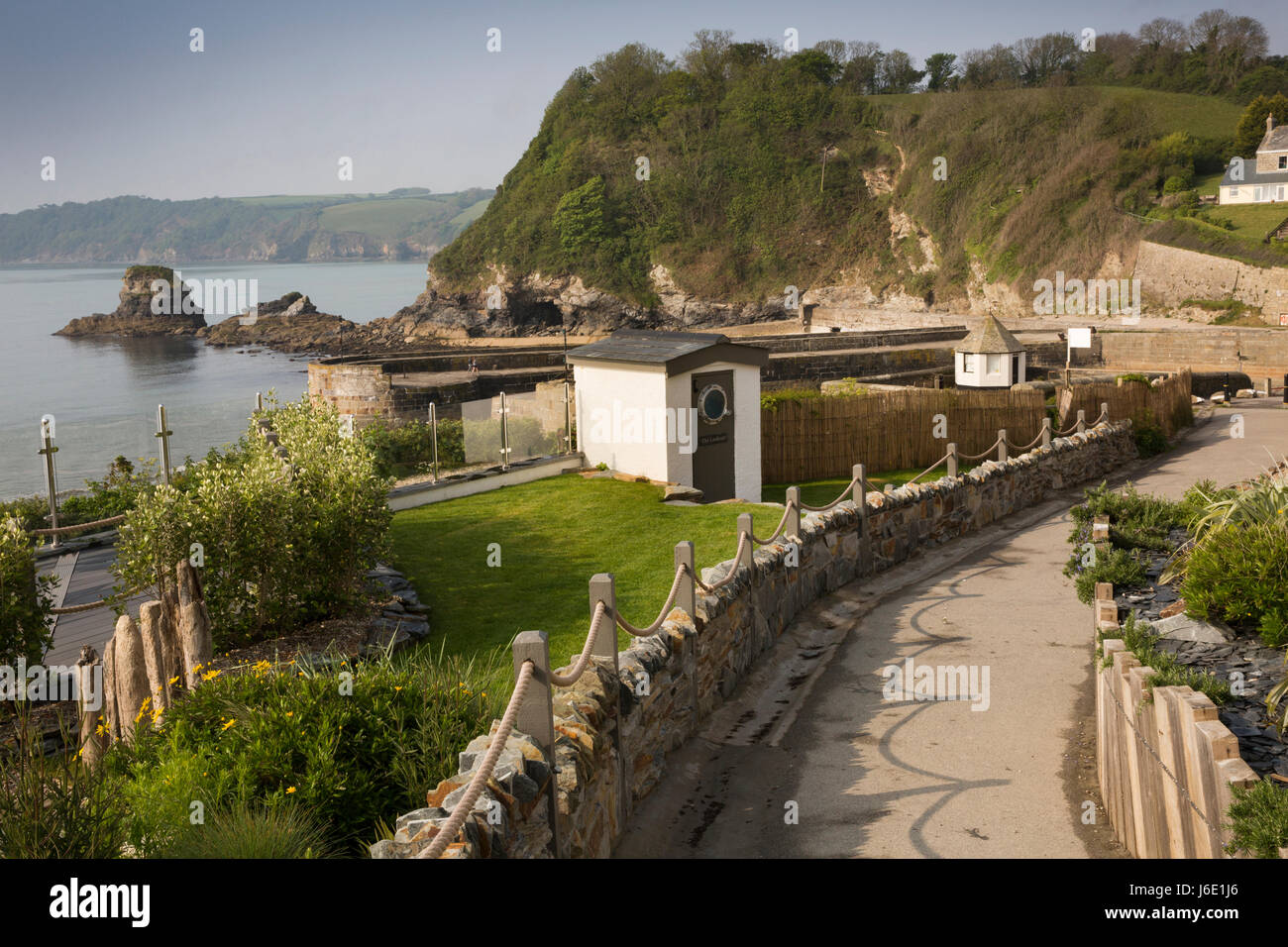 UK, Cornwall, St Austell, The Lookout beside coast path descending to historic Charlestown harbour Stock Photo