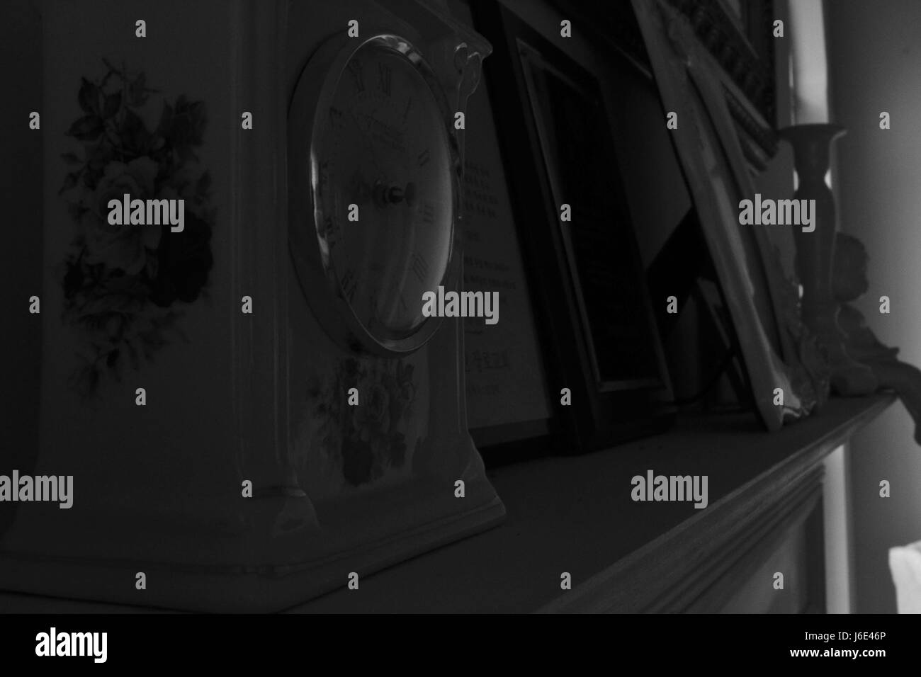 Antique clock on shelf Stock Photo Alamy