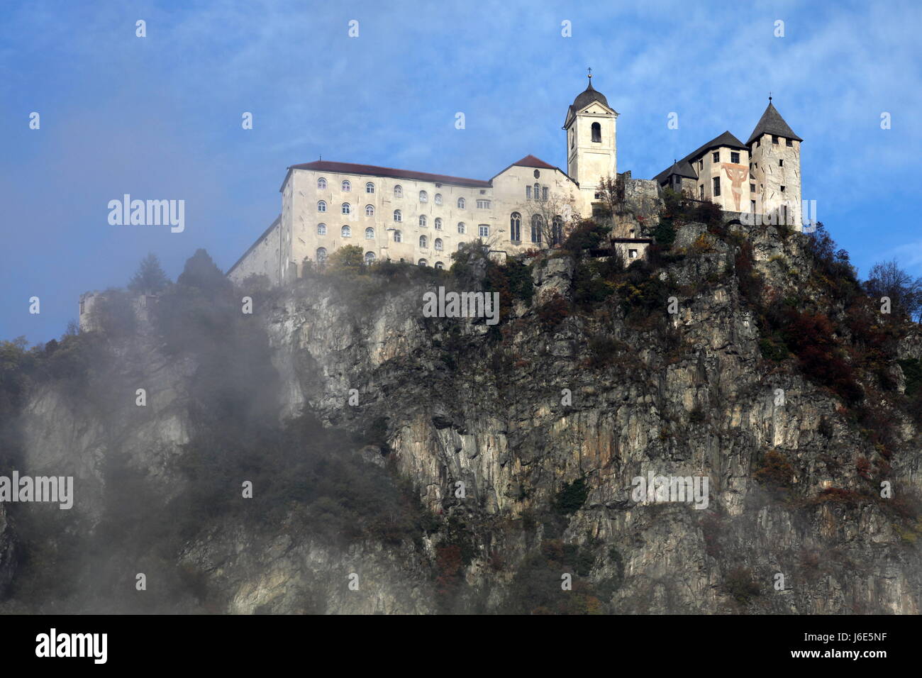 south tyrol fog rock monastery convent italy mountains south tyrol fog rock Stock Photo