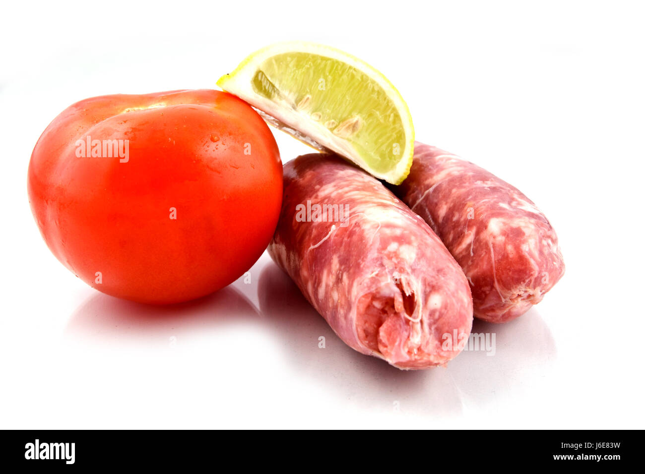 sausage italian tomato bacon cropped butcher lemon citron eating eat eats Stock Photo