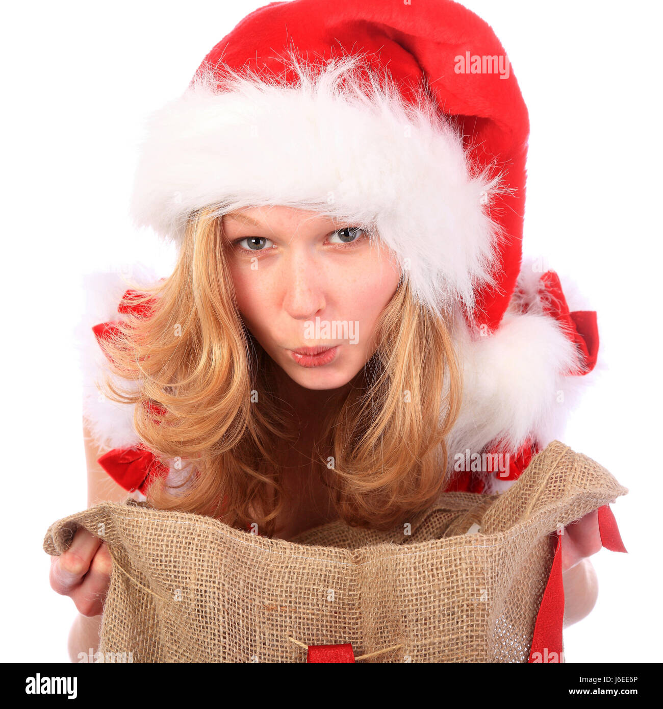 woman female christmas sack girl girls xmas x-mas bag curious woman laugh Stock Photo