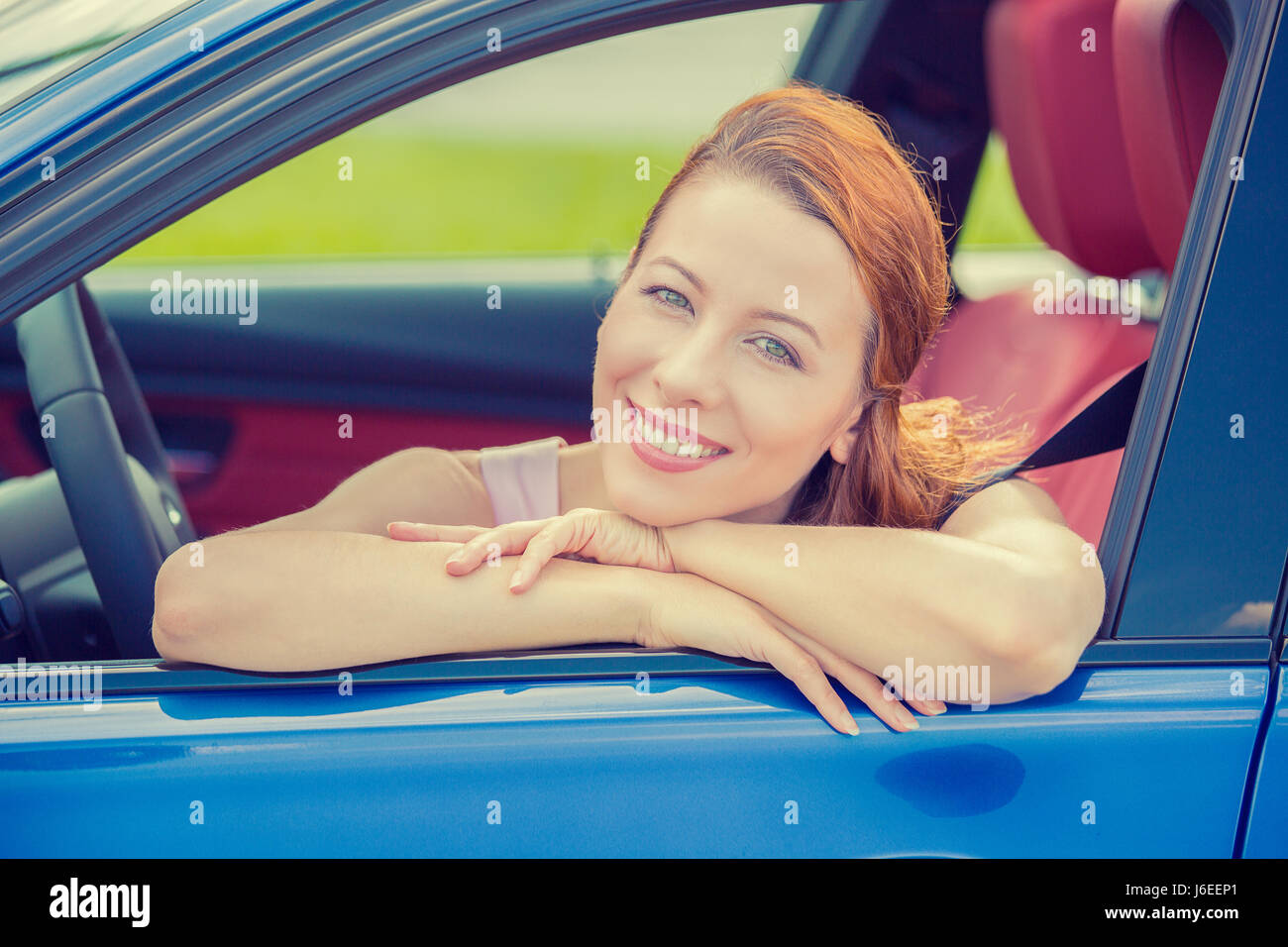 Smiling Happy Woman Sitting In A New Blue Car Stock Photo Alamy smiling-happy-woman-sitting-in-a-new-blue-car-stock-photo-alamy