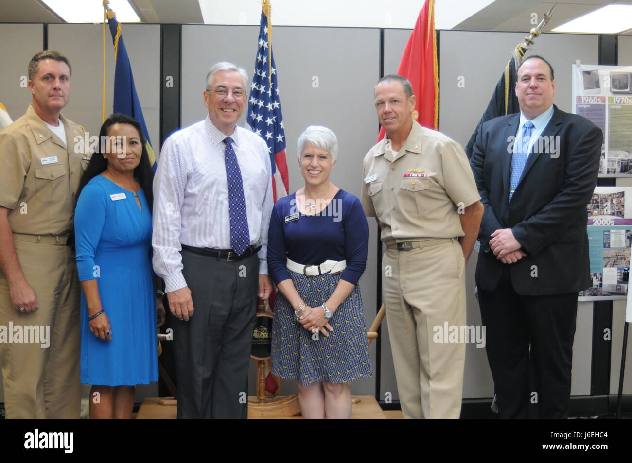 SAN DIEGO -- The Chief of Naval Operations Navy Ombudsman at Large, Martha Faller, visited with the Household Goods (HHG) Team at Naval Supply Systems Command Global Logistics Support (NAVSUP GLS). Standing in the NAVSUP GLS quarterdeck area are (L to R): NAVSUP GLS Chief of Staff Capt. Raymond Bouchard, NAVSUP GLS Household Goods Program Manager Deborah McGlennon, NAVSUP GLS Vice Commander Bill Bickert, Navy Ombudsman at Large Martha Faller, NAVSUP GLS Commander Rear Adm. James McNeal, and NAVSUP GLS Warfighter and Family Support Department Head Paul Brown.  U.S. Navy photo by Paul Dunn, NAVS Stock Photo