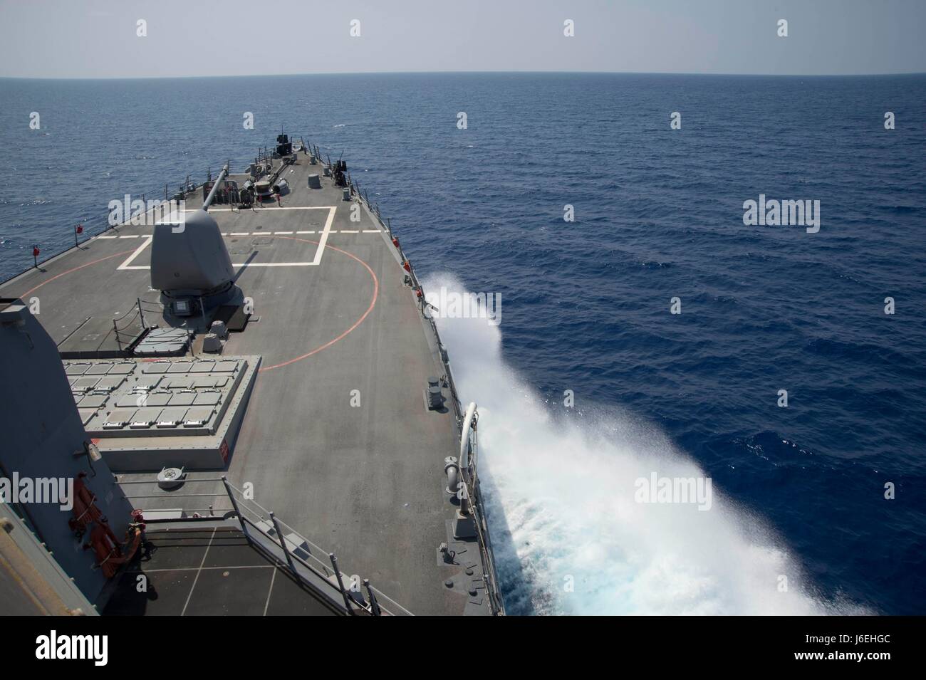 An arleigh burke class guided missile destroyer forward deployed to ...