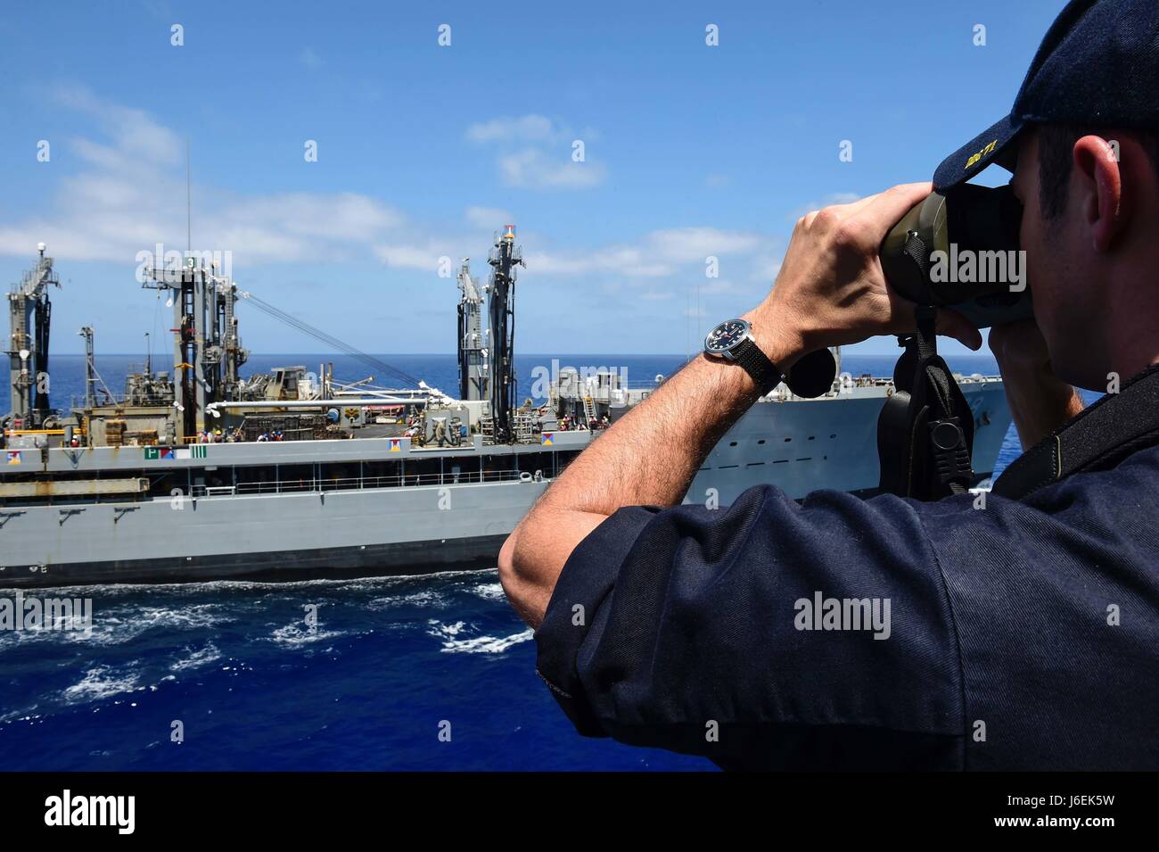 An arleigh burke class guided missile destroyer forward deployed to ...