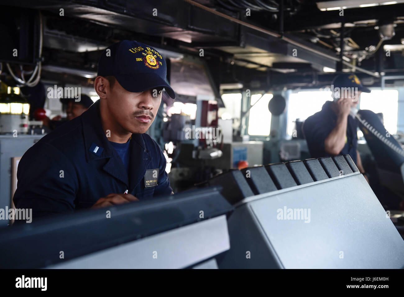 160823-N-FP878-092 MEDITERRANEAN SEA (Aug. 23, 2016) Lt. j.g. Marlowe Gonzales from Yokosuka, Japan, stands bridge watch aboard USS Ross (DDG 71) Aug. 23, 2016.  Ross, an Arleigh Burke-class guided-missile destroyer, forward-deployed to Rota, Spain, is conducting naval operations in the U.S. 6th Fleet Area of Operations in support of U.S. national security interests in Europe and Africa. (U.S. Navy photo by Mass Communication Specialist 1st Class Theron J. Godbold/Released) Stock Photo