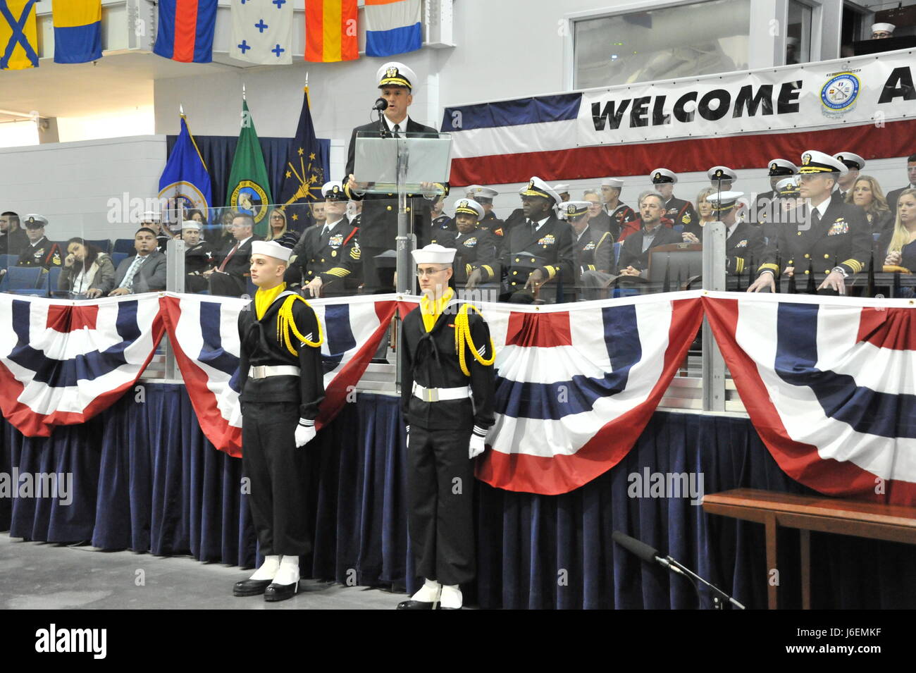 161216-N-CM124-342  Chief of Naval Personnel Robert P. Burke speaks to the guests at the Pass-In-Review ceremony Dec. 16 at Midway Ceremony Drill Hall, Recruit Training Command. Burke served as the ceremony’s reviewing officer where just over 940 recruits graduated from the Navy’s only boot camp.  (U.S. Navy photo by Susan Krawczyk/Released). Stock Photo