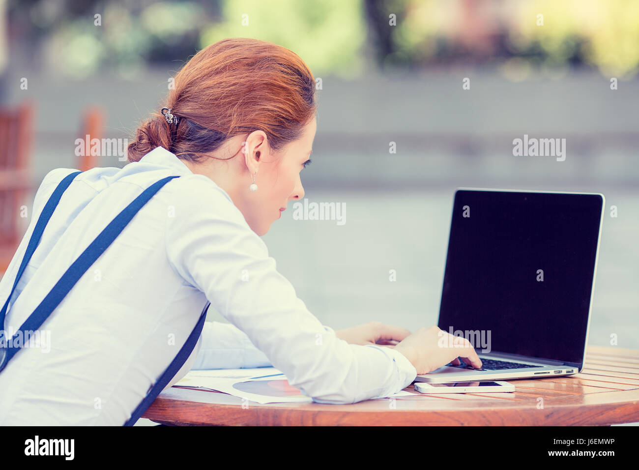 Closeup young business woman entrepreneur resting hands on keyboard ...