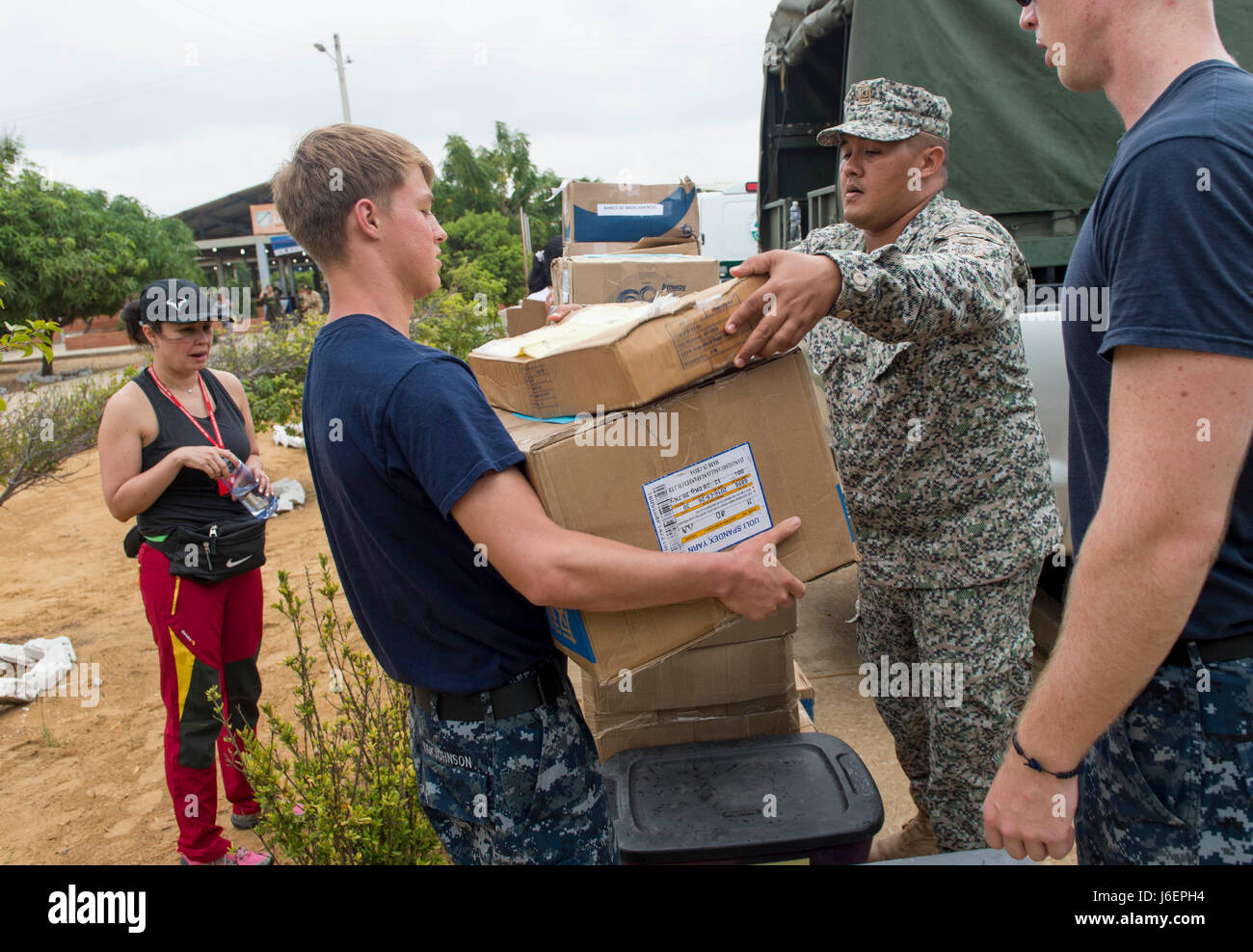 170324-N-YL073-036 MAYAPO, Colombia (March 24, 2017) - Hospitalman Kraylor Kirk-Johnson, a native of Laguna Beach, Calif., assigned to Naval Branch Health Clinic Jacksonville, Fla., moves medical supplies donated to the people of Colombia by the U.S. charity Children’s Vision International at the Continuing Promise 2017 (CP-17) medical site in Mayapo, Colombia. CP-17 is a U.S. Southern Command-sponsored and U.S. Naval Forces Southern Command/U.S. 4th Fleet-conducted deployment to conduct civil-military operations including humanitarian assistance, training engagements, and medical, dental, and Stock Photo