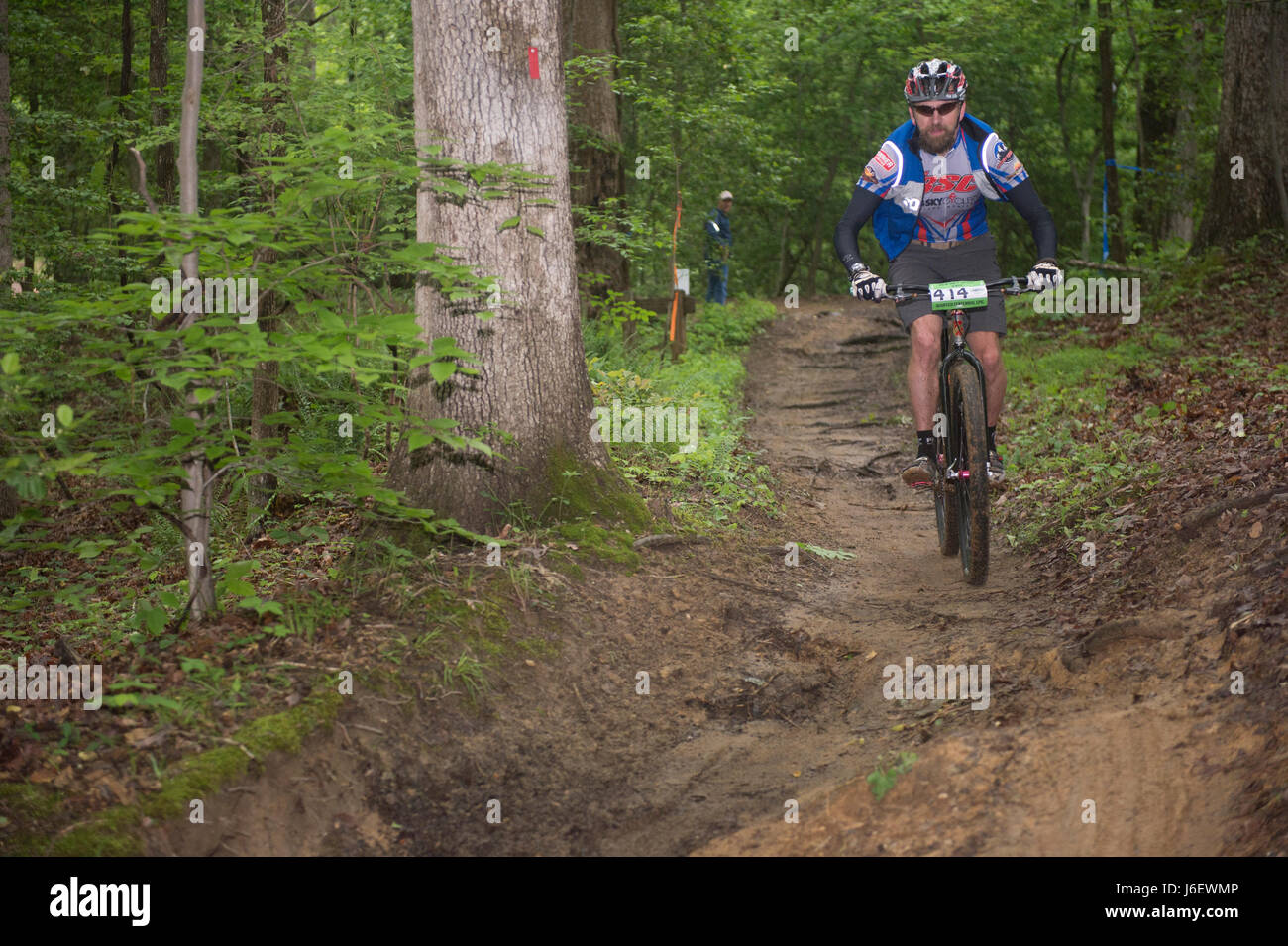 A participant cycles during the Centennial Epic Mountain Bike Ride