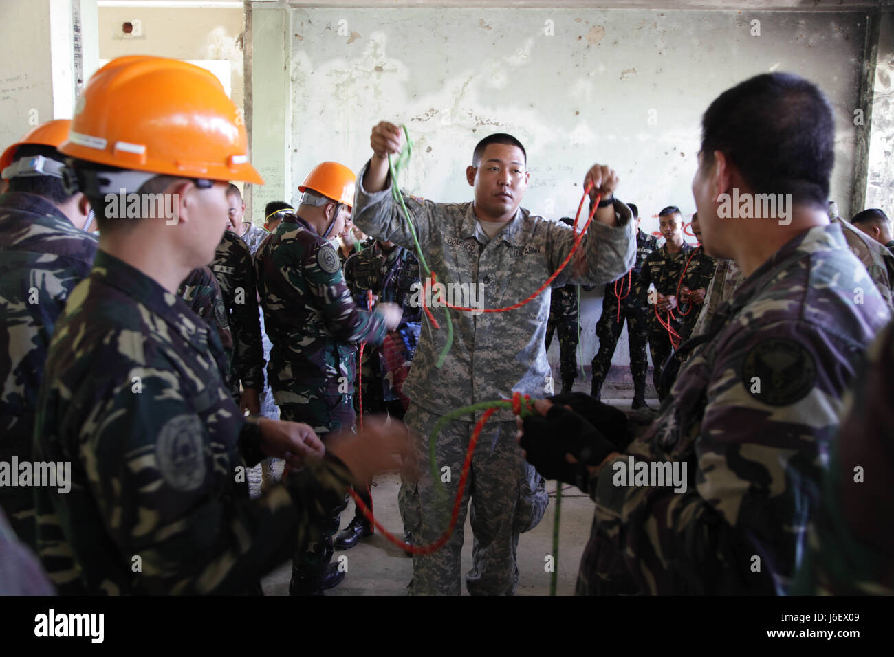 U.S. Army Staff Sgt. Jason Domingo, Hawaii National Guard, demonstrates ...