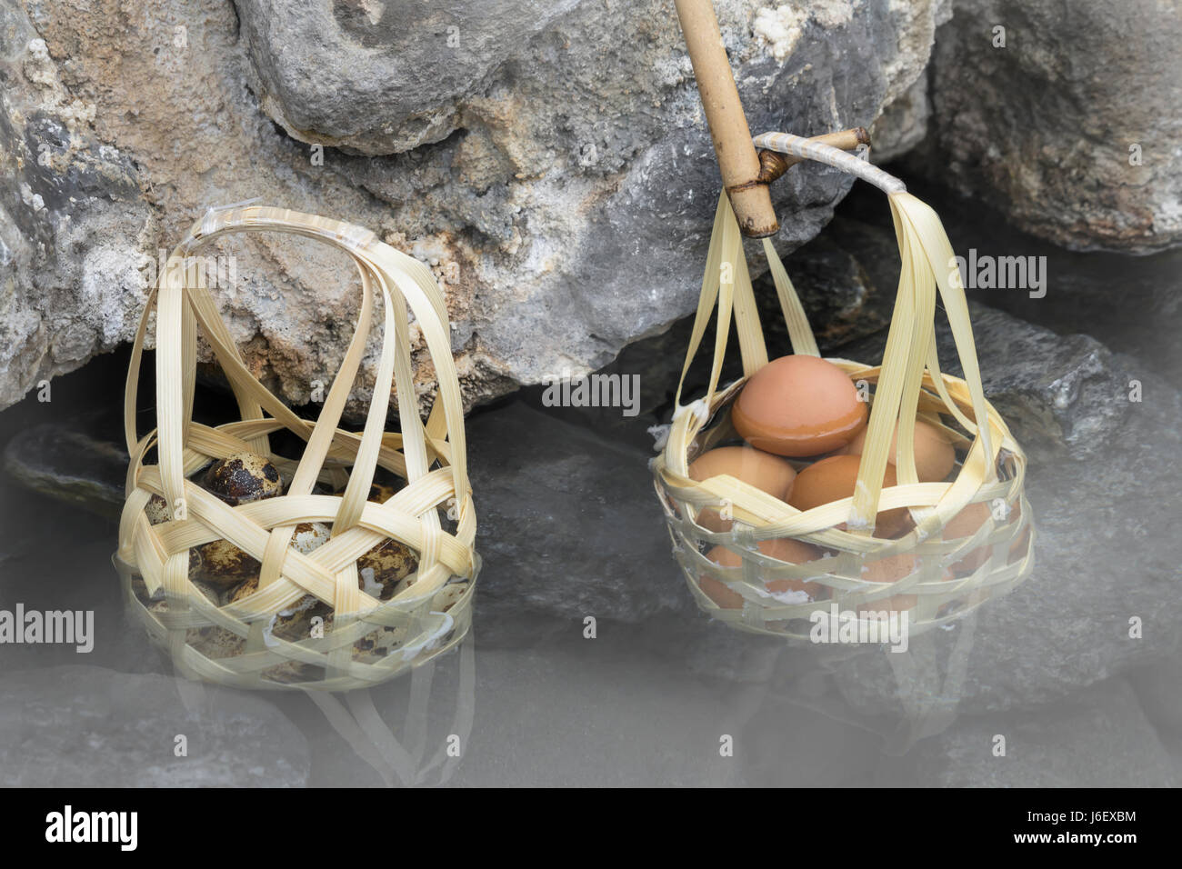 Boiled eggs in basket in nature hot springs Stock Photo Alamy