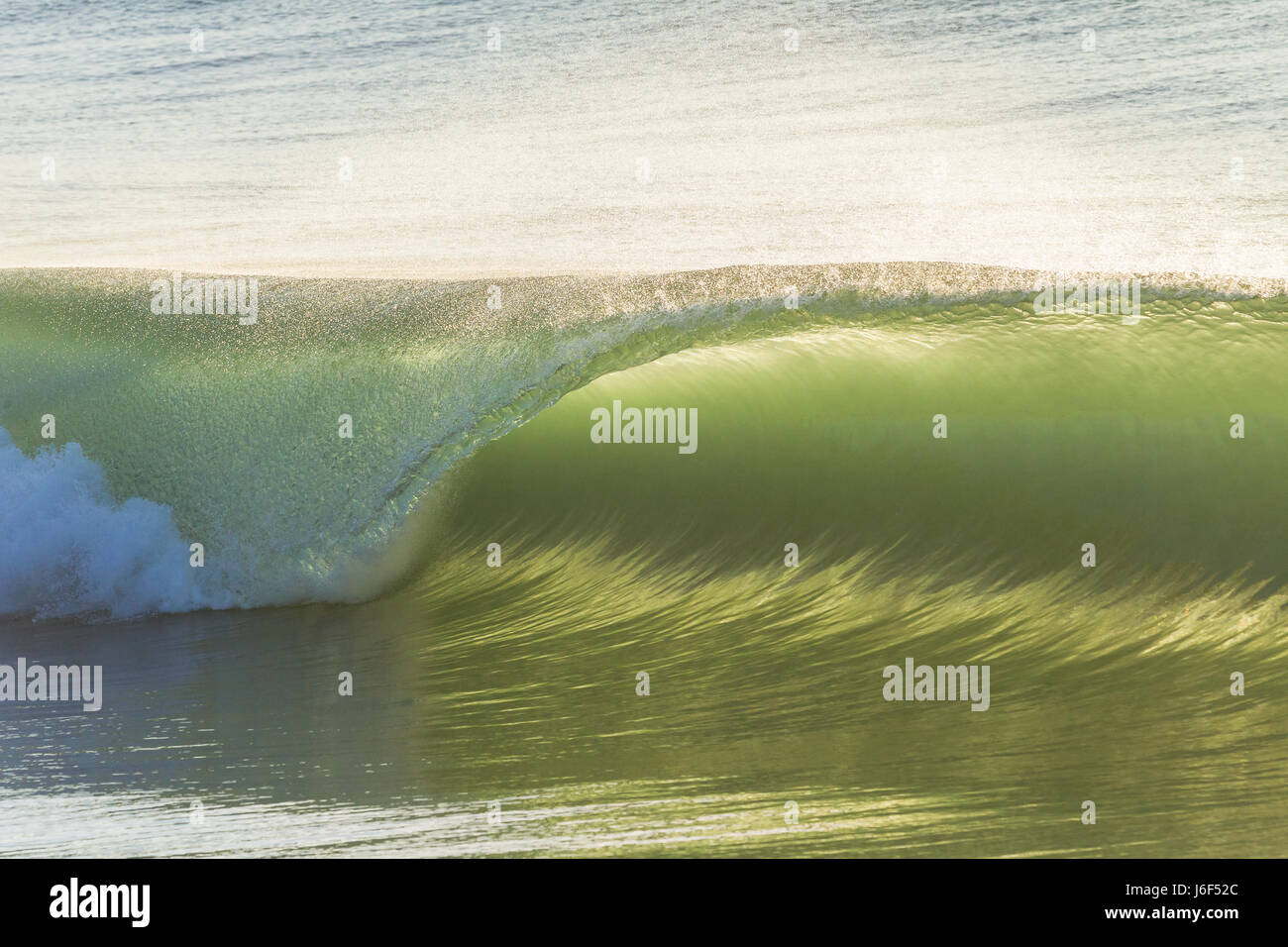 Wave curling crashing water closeup ocean beach Stock Photo