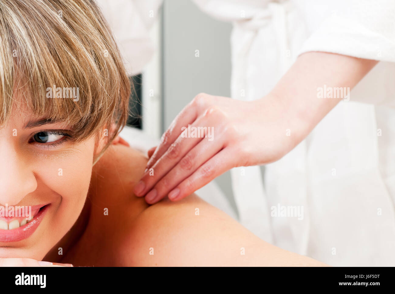 woman care wellness massage cosmetics beauty care enthusiasm amusement Stock Photo